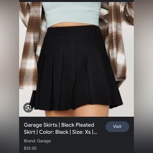 Black Pleated Skirt by Garage